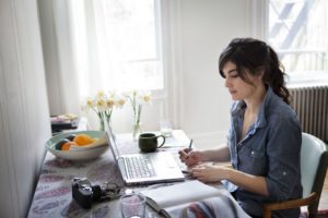 girl writing strong prose and editing